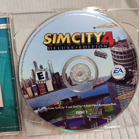 Vintage Lot of 3 items-One Electronic Handheld Game and Two PC Games-Pre Owned - Picture 4 of 16